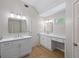 Elegant bathroom with dual vanities, modern fixtures, and plenty of counter space at 4016 Upland Trce, Marietta, GA 30066