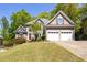 Charming two-story home with a well-manicured lawn and attached two-car garage at 4016 Upland Trce, Marietta, GA 30066