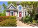 Inviting home entrance with lush landscaping and stone pathway leading to the front door at 4016 Upland Trce, Marietta, GA 30066