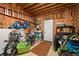 A well-organized garage space with exposed ceiling beams and ample storage for tools and equipment at 4016 Upland Trce, Marietta, GA 30066
