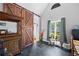 Office space with natural light, large sliding barn door, and room for a desk and storage at 4016 Upland Trce, Marietta, GA 30066