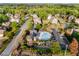 Aerial community shot showcasing pool, play area and well-maintained landscaping at 895 Ovalene Sw Ln, Marietta, GA 30064