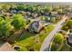 Beautiful aerial view of a landscaped home with a manicured lawn and mature trees at 895 Ovalene Sw Ln, Marietta, GA 30064