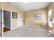 Bedroom with neutral walls and soft carpet, creating a warm and comfortable retreat at 895 Ovalene Sw Ln, Marietta, GA 30064