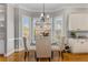 Eat-in breakfast nook area with great natural light and stylish chairs at 895 Ovalene Sw Ln, Marietta, GA 30064