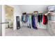 Walk-in closet with ample storage and hanging space, accessed from the bedroom at 895 Ovalene Sw Ln, Marietta, GA 30064