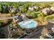 Community pool with lounge chairs, play ground and manicured landscaping at 895 Ovalene Sw Ln, Marietta, GA 30064