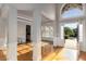 Elegant foyer showcasing hardwood floors, grand entryway and sun-filled windows at 895 Ovalene Sw Ln, Marietta, GA 30064