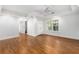Spacious main bedroom with hardwood floors, walk-in closet, tray ceiling, and natural light at 895 Ovalene Sw Ln, Marietta, GA 30064