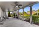 Covered patio with ceiling fans and stairs leading to yard at 895 Ovalene Sw Ln, Marietta, GA 30064