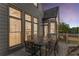 Cozy outdoor dining area with a view of the landscaped backyard at 895 Ovalene Sw Ln, Marietta, GA 30064