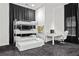 Bedroom with a triple bunk bed, desk, and stylish decor at 1081 Humphries Nw Rd, Conyers, GA 30012