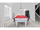 Bright game room with a billiard table and natural light at 1081 Humphries Nw Rd, Conyers, GA 30012
