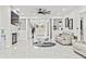 Bright, open living room with fireplace, modern decor, and abundant natural light at 1081 Humphries Nw Rd, Conyers, GA 30012
