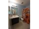Bathroom with sunflower shower curtain and blue walls at 4775 Ben Hill Rd, Douglasville, GA 30134