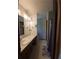 Bathroom with long vanity and toilet at 4775 Ben Hill Rd, Douglasville, GA 30134