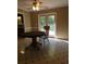 Cozy dining area with classic table set, offering a inviting space for meals and gatherings near outdoor views at 4775 Ben Hill Rd, Douglasville, GA 30134