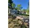 Two-story home with attached garage, cozy front porch and well-maintained front lawn at 4775 Ben Hill Rd, Douglasville, GA 30134