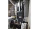 This utility room has a new washer and dryer along with an efficient water heater and a modern furnace at 4775 Ben Hill Rd, Douglasville, GA 30134