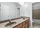 Bathroom featuring double sinks and granite countertops at 617 Wexford Ct, Acworth, GA 30102