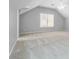 Large carpeted bedroom with vaulted ceiling, and abundant natural light at 617 Wexford Ct, Acworth, GA 30102