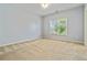 Bright bedroom with a ceiling fan and a large window offering natural light at 617 Wexford Ct, Acworth, GA 30102