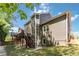 Multi-story home exterior with wood siding, a wood deck, and mature landscaping at 617 Wexford Ct, Acworth, GA 30102