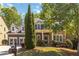 Charming two-story home with a stone and siding facade, well-manicured lawn, and attached two-car garage at 617 Wexford Ct, Acworth, GA 30102