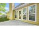 Back of home with an outdoor patio, large windows, and a partial view of the yard, perfect for entertaining at 782 Ridgeland Trl, Clarkston, GA 30021