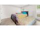Comfortable bedroom with ample natural light, laminate flooring, and space for creating a restful retreat at 782 Ridgeland Trl, Clarkston, GA 30021