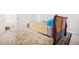 Bright bedroom shows a view of the connecting bathroom and highlights its bright laminate flooring and natural light at 782 Ridgeland Trl, Clarkston, GA 30021
