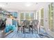 Bright dining area with views to the backyard, flowing into the kitchen and living areas at 782 Ridgeland Trl, Clarkston, GA 30021