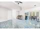 Bright, open living room featuring unique tile flooring and large windows providing ample natural light at 782 Ridgeland Trl, Clarkston, GA 30021