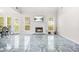 Spacious living room with fireplace and access to the outdoors, perfect for entertaining at 782 Ridgeland Trl, Clarkston, GA 30021