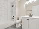 Modern bathroom featuring elegant marble-look shower tile and sleek black fixtures at 1158 Crystal Lake Rd, Atlanta, GA 30349