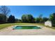 Large backyard featuring a swimming pool and ample green space for recreation and relaxation at 116 Ridge Xing, Temple, GA 30179