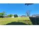 Expansive backyard featuring a well-maintained lawn and a charming shed at 116 Ridge Xing, Temple, GA 30179