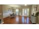 Dining area featuring hardwood floors and natural lighting for a bright and airy feel at 116 Ridge Xing, Temple, GA 30179