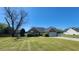 Charming brick home featuring an attached garage, manicured lawn, and well-maintained landscaping at 116 Ridge Xing, Temple, GA 30179