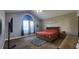 Main bedroom featuring a vaulted ceiling, large windows, and natural light at 116 Ridge Xing, Temple, GA 30179