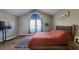 Main bedroom showcasing large windows, a vaulted ceiling, and great natural light at 116 Ridge Xing, Temple, GA 30179