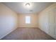Cozy bedroom featuring plush carpet, and a double door closet at 4510 Trumble Ter, Snellville, GA 30039