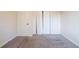 This bedroom has neutral carpet, light walls and a closet for storage at 4510 Trumble Ter, Snellville, GA 30039