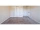 The bedroom has neutral walls and soft carpet, with ample closet space at 4510 Trumble Ter, Snellville, GA 30039
