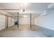 Spacious two car garage with bright lighting and concrete flooring at 4510 Trumble Ter, Snellville, GA 30039