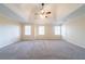 Large primary bedroom with neutral paint and carpet at 4510 Trumble Ter, Snellville, GA 30039