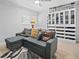 Bedroom with a comfortable sleeper sofa and built-in storage at 69 Country Place Ct, Alpharetta, GA 30005