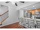 Bright kitchen with stainless steel appliances, granite countertops, and breakfast bar seating at 69 Country Place Ct, Alpharetta, GA 30005