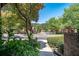 Picturesque street view showcasing the community's well-manicured lawns and charming homes at 69 Country Place Ct, Alpharetta, GA 30005