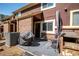 Relaxing outdoor patio featuring a grill and seating, perfect for enjoying the backyard at 69 Country Place Ct, Alpharetta, GA 30005